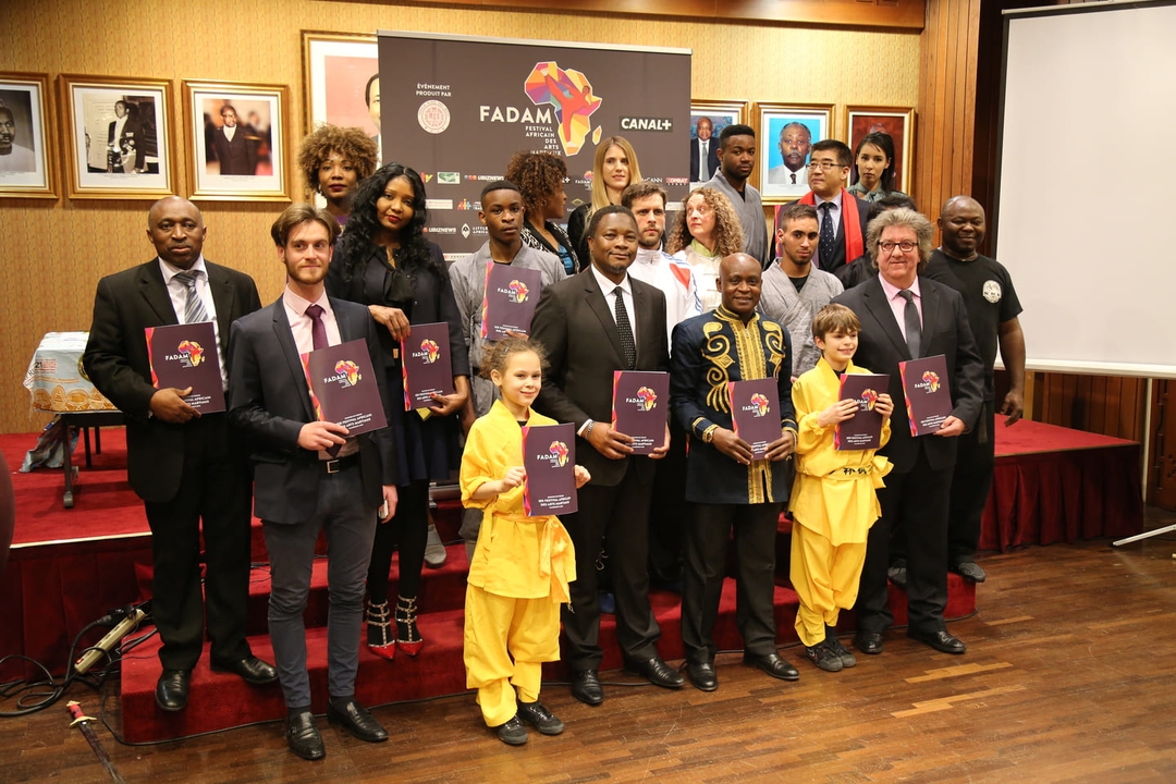 The FADAM team posing for a picture during a press conference