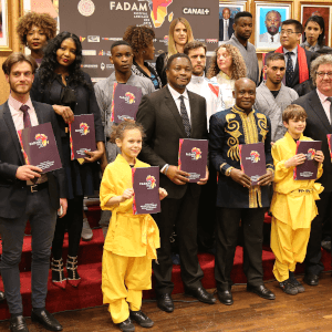 Athletes and organising committee posing for a photo